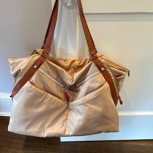 Brand new light taupe bag.